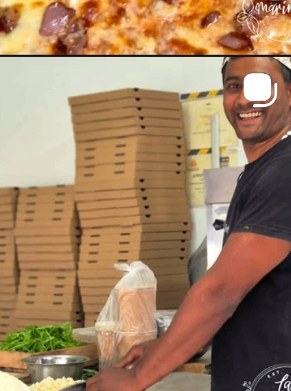 Chef Paolo smiling next to a tower of takeaway pizza boxes at La Marinara